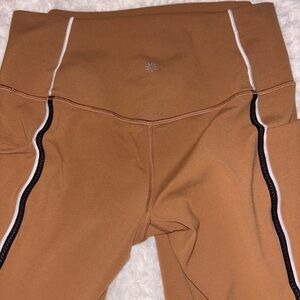 Athleta Salutation Stash Tipped Tight in Warm Camel